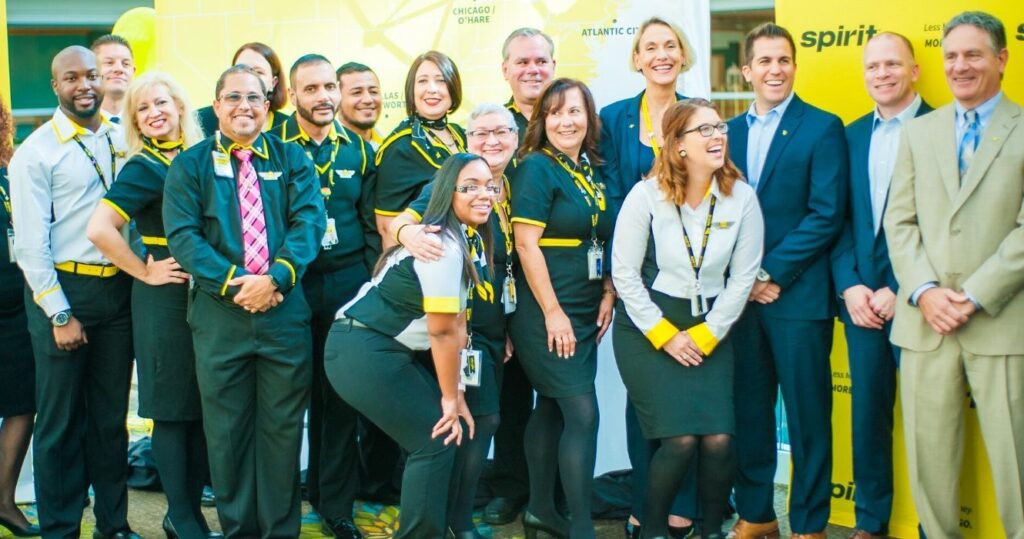 a photo of spirit airlines staff at an event