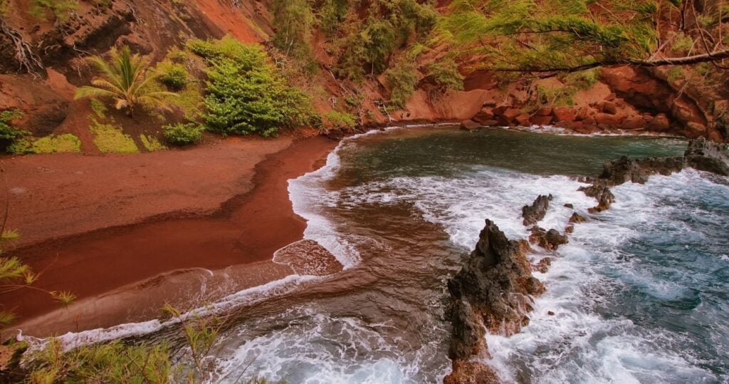 Kaihalulu red sand beach in hawaii